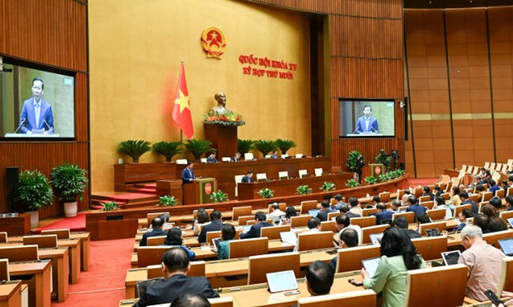 Quốc hội làm việc tại hội trường, nghe Tờ trình và Báo cáo thẩm tra dự án Luật sửa đổi, bổ sung một số điều của Luật Quản lý nợ công.